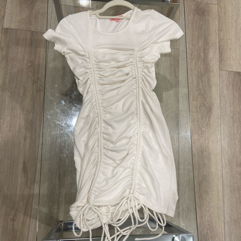 Tight white short sleeved mini dress